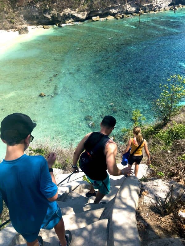 Hiking down the path to Atuh Beach Nusa Penida Indonesia