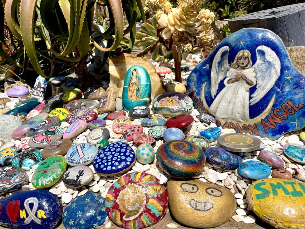Colorful rocks with inspiring messages at Dave's Rock Garden in Encinitas