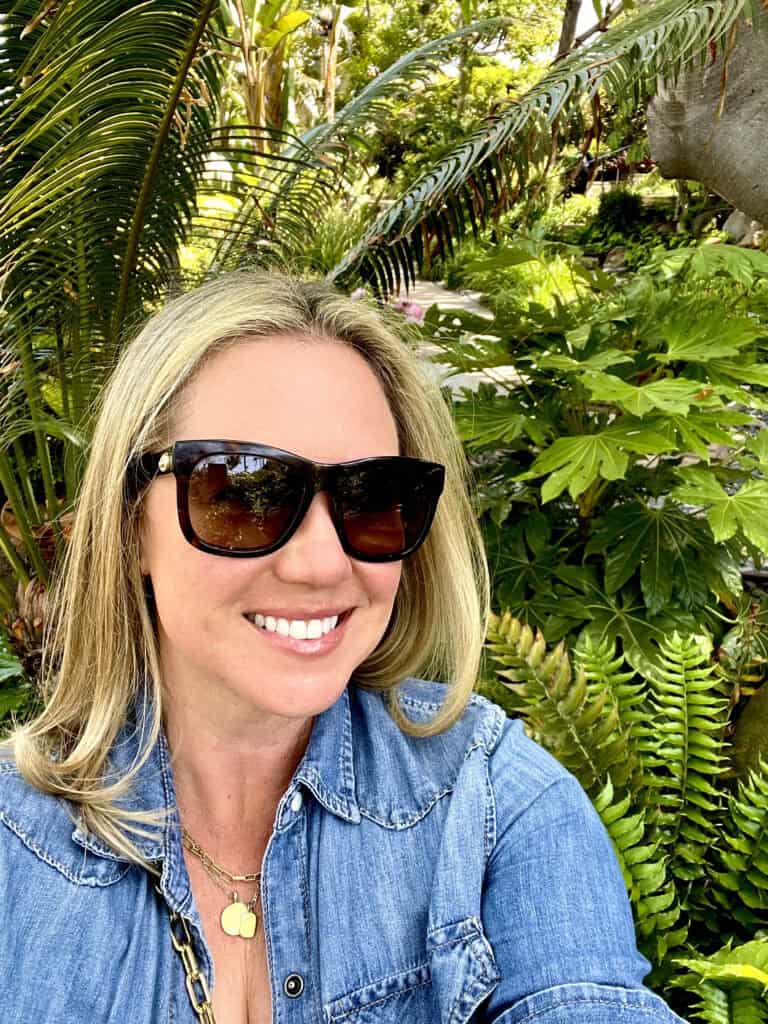 Jennifer Femrite, owner of Seeking Stamps travel blog at the Encinitas Realization Fellowship Garden.